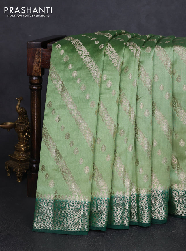 Chiniya silk saree pastel green and dark green with allover zari weaves and zari woven border
