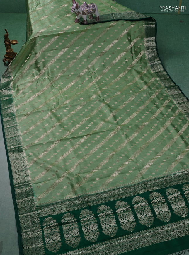 Chiniya silk saree pastel green and dark green with allover zari weaves and zari woven border