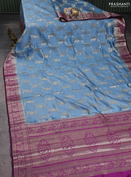 Chiniya silk saree bluish grey and purple with allover floral zari weaves and zari woven border