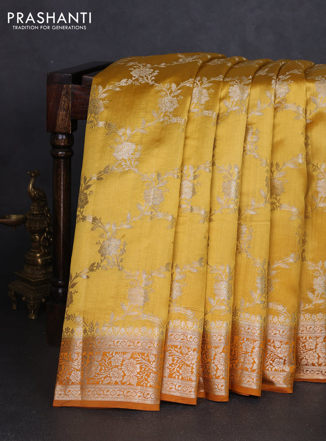 Chiniya silk saree mustard yellow and dark mustard with allover floral zari weaves and zari woven border