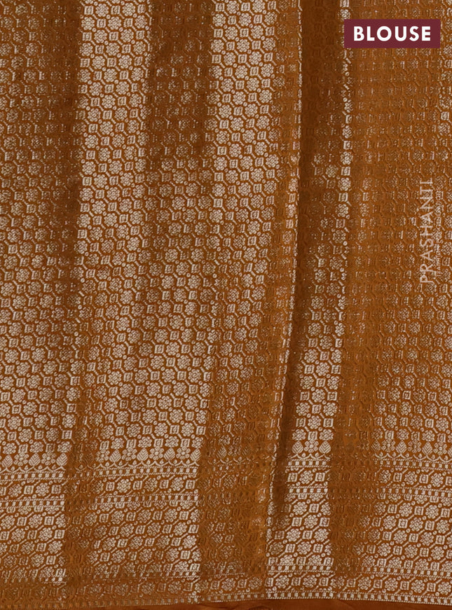 Chiniya silk saree mustard yellow and dark mustard with allover floral zari weaves and zari woven border