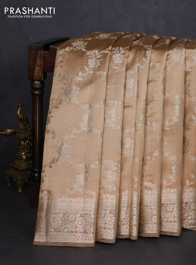 Chiniya silk saree sandal and pastel brown with allover floral zari weaves and zari woven border
