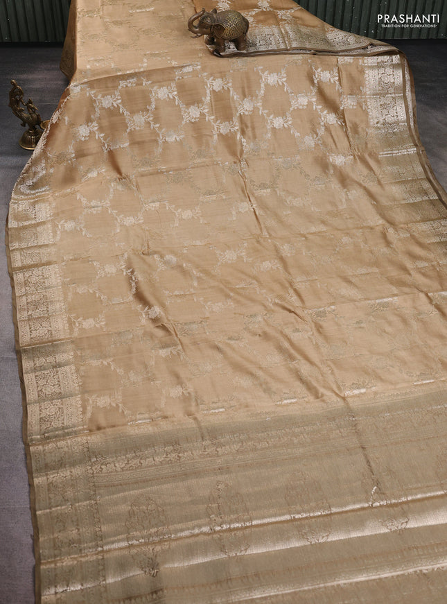 Chiniya silk saree sandal and pastel brown with allover floral zari weaves and zari woven border