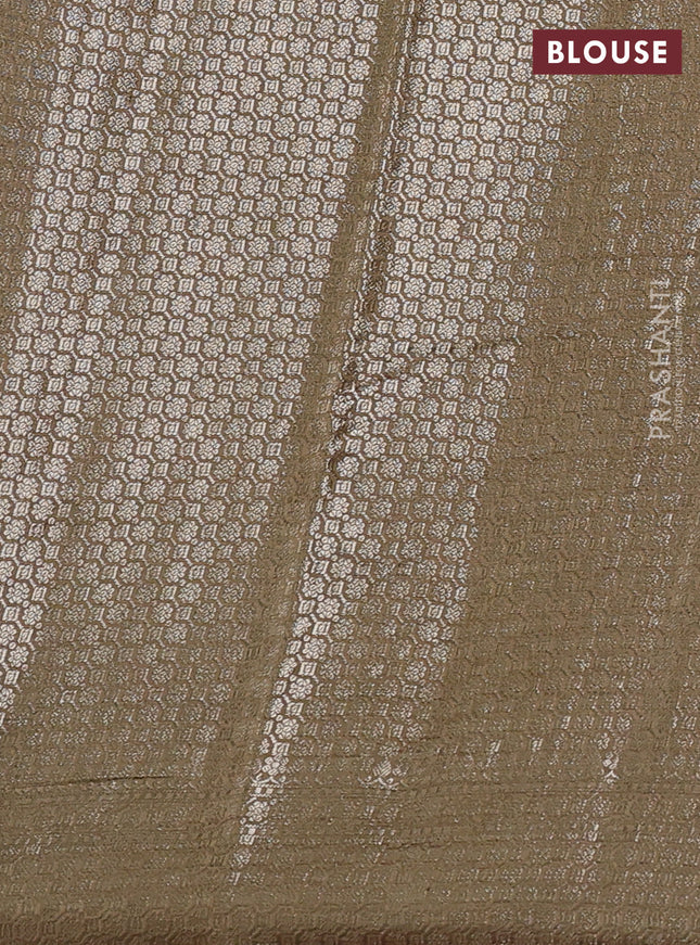 Chiniya silk saree sandal and pastel brown with allover floral zari weaves and zari woven border