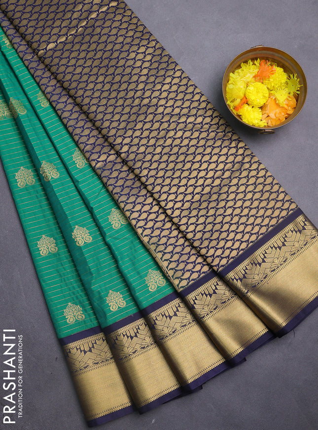 Semi kanchipuram silk saree green and navy blue with allover zari weaves & buttas and rich zari woven korvai border
