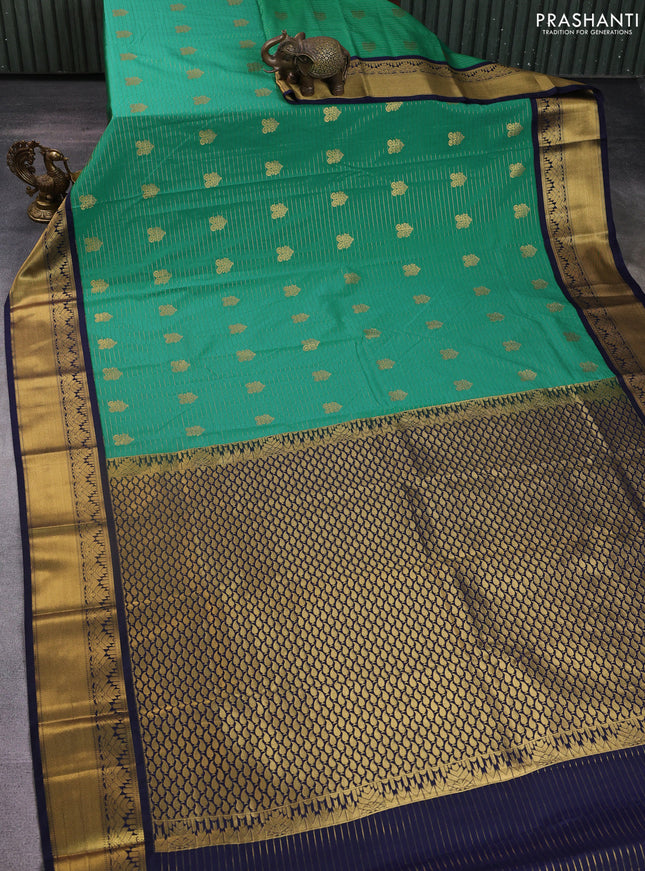 Semi kanchipuram silk saree green and blue with allover zari weaves & buttas and rich zari woven korvai border