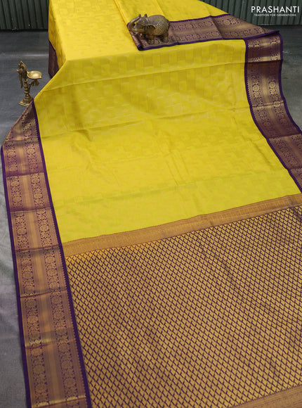 Semi kanchipuram silk saree lime yellow and violet with allover zari checks & buttas and rettapet zari woven korvai border