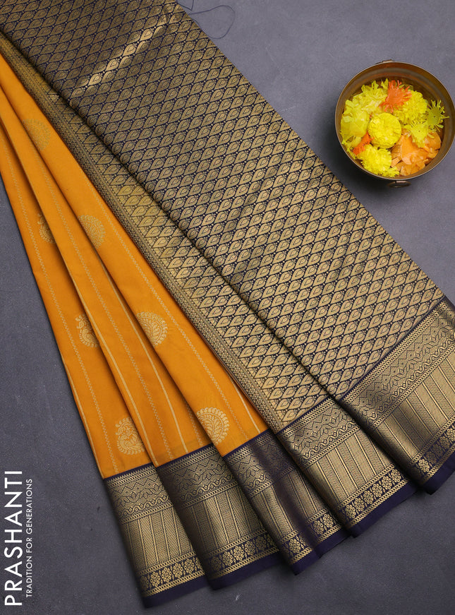 Semi kanchipuram silk saree mustard yellow and navy blue with allover zari weaves & buttas and zari woven korvai border