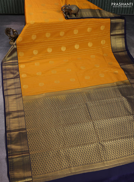 Semi kanchipuram silk saree mustard yellow and navy blue with allover zari weaves & buttas and zari woven korvai border