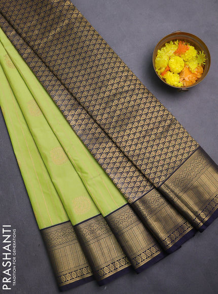 Semi kanchipuram silk saree lime green and navy blue with allover zari weaves & buttas and zari woven korvai border