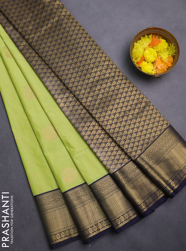 Semi kanchipuram silk saree lime green and navy blue with allover zari weaves & buttas and zari woven korvai border