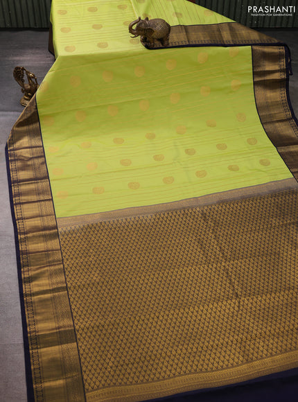 Semi kanchipuram silk saree lime green and navy blue with allover zari weaves & buttas and zari woven korvai border