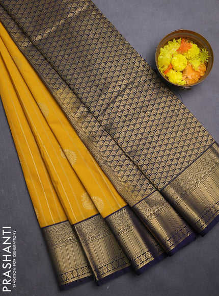 Semi kanchipuram silk saree yellow and navy blue with allover zari weaves & buttas and zari woven korvai border