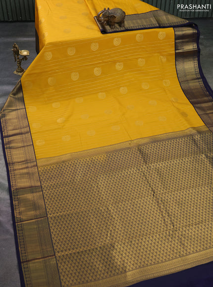 Semi kanchipuram silk saree yellow and navy blue with allover zari weaves & buttas and zari woven korvai border