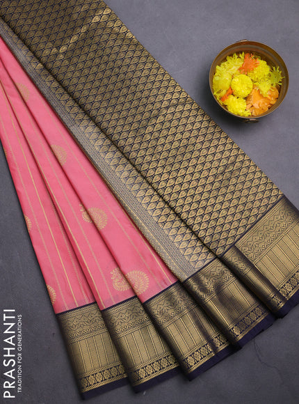 Semi kanchipuram silk saree peach pink and navy blue with allover zari weaves & buttas and zari woven korvai border