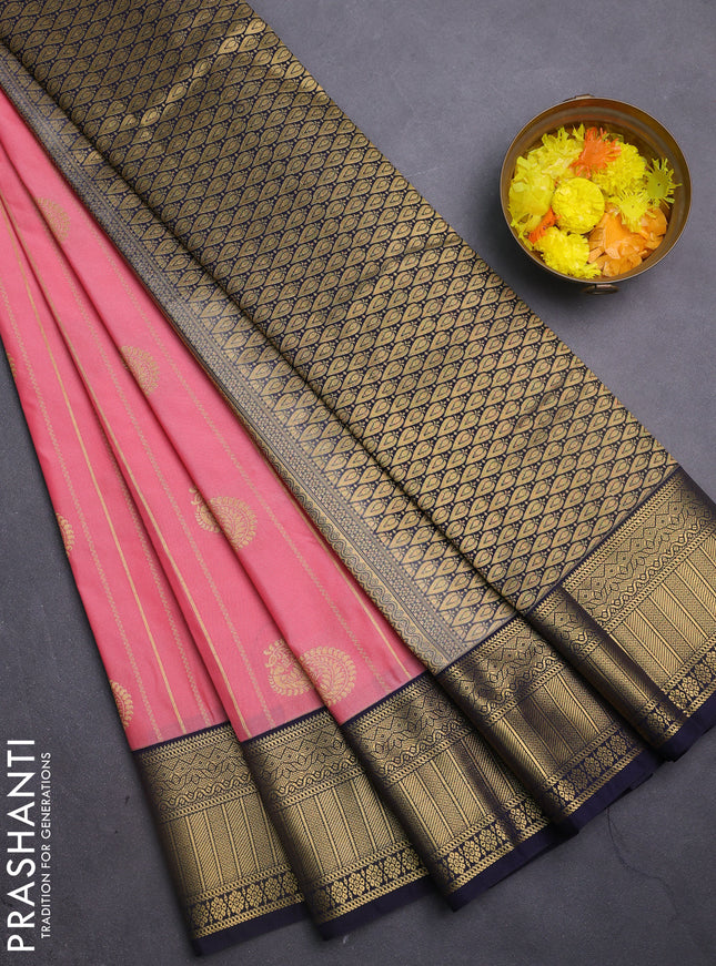 Semi kanchipuram silk saree peach pink and navy blue with allover zari weaves & buttas and zari woven korvai border