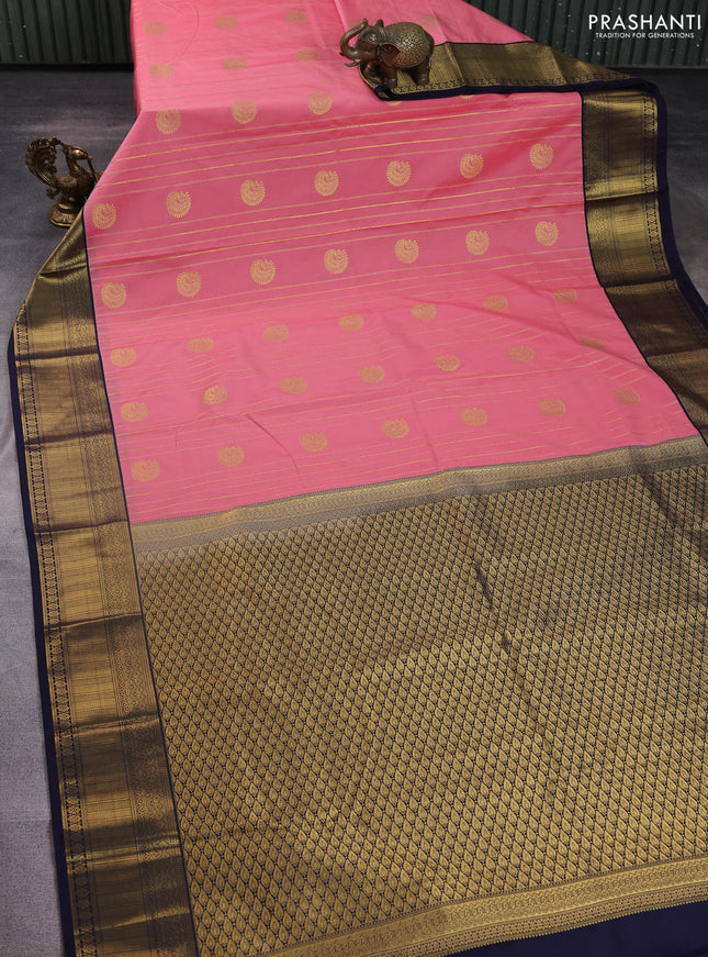 Semi kanchipuram silk saree peach pink and navy blue with allover zari weaves & buttas and zari woven korvai border