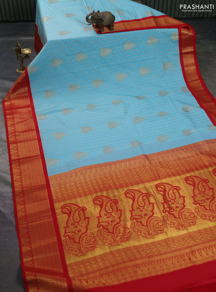 Semi kanchipuram silk saree teal blue and red with allover silver & zari woven buttas and temple zari woven korvai border