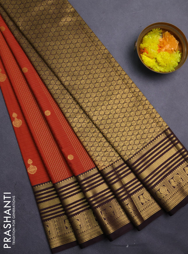 Semi kanchipuram silk saree rustic orange and coffee brown with allover zari checks & buttas and zari woven korvai border