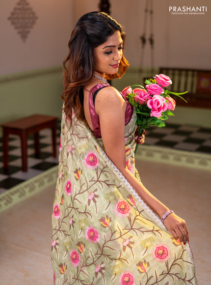 Tissue organza saree pista green with floral embroidery work