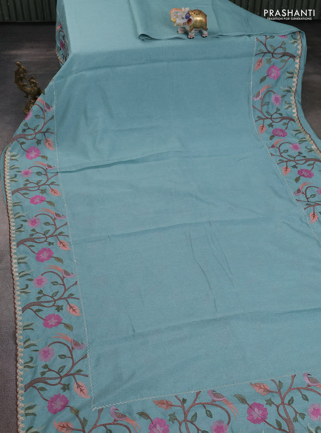 Tissue organza saree teal blue with plain body and embroidery border