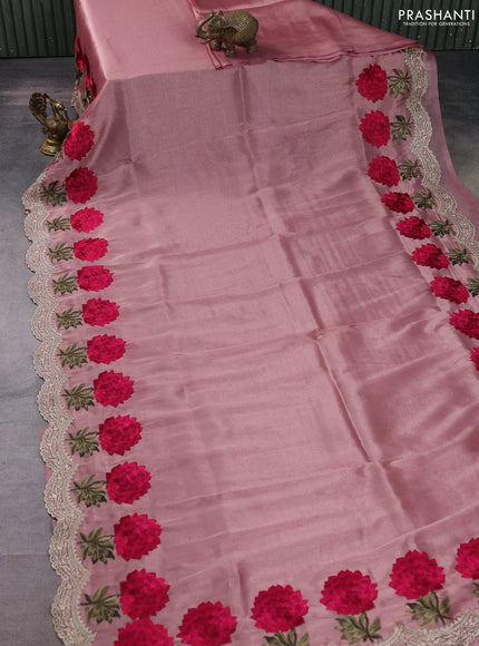 Tissue organza saree pastel peach with plain body and floral embroidery border