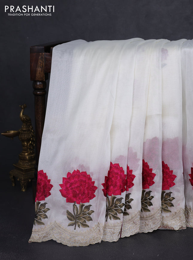 Tissue organza saree cream with plain body and floral embroidery border