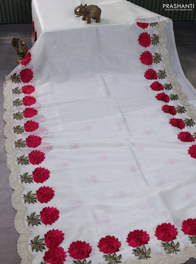 Tissue organza saree cream with plain body and floral embroidery border