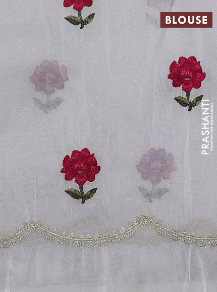 Tissue organza saree cream with plain body and floral embroidery border