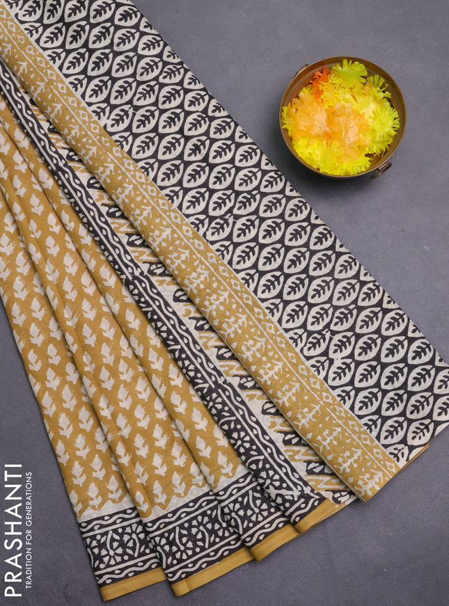 Jaipur cotton saree mustard shade and black with allover prints and printed border