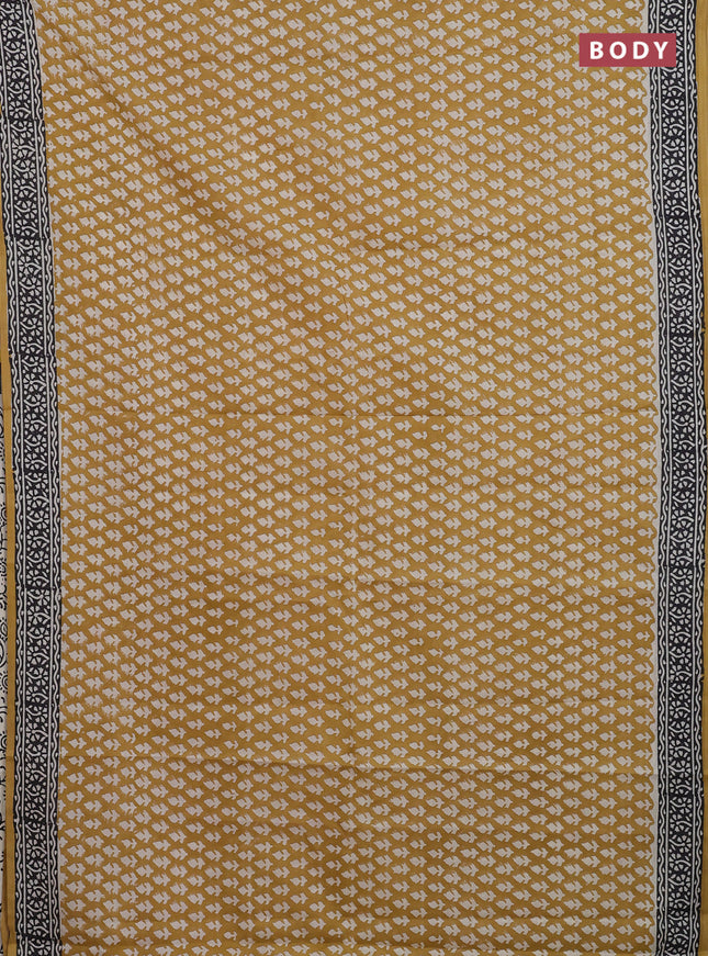 Jaipur cotton saree mustard shade and black with allover prints and printed border