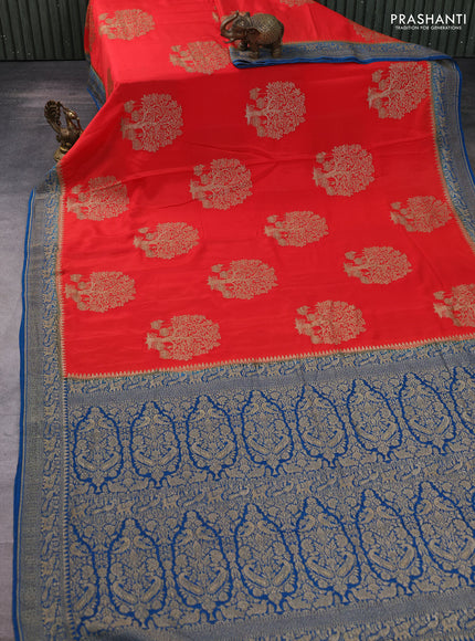 Banarasi crepe saree orange and peacock blue with thread & zari woven buttas and woven border