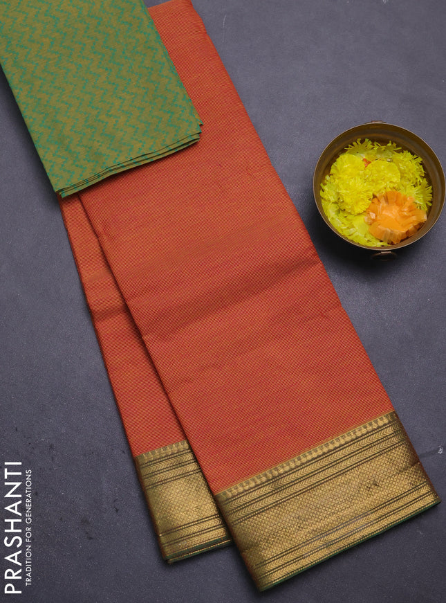Chettinad cotton saree rust shade and green with allover small checked pattern and zari woven border
