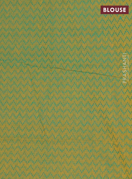 Chettinad cotton saree rust shade and green with allover small checked pattern and zari woven border