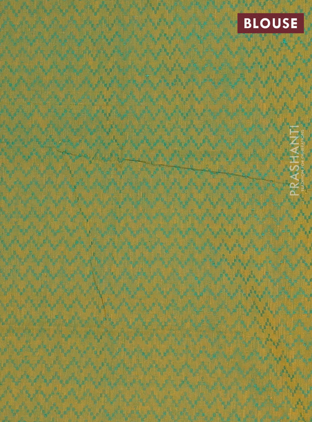 Chettinad cotton saree rust shade and green with allover small checked pattern and zari woven border
