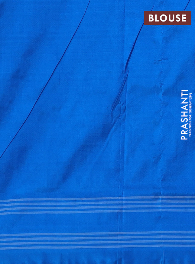 Pochampally silk saree red shade and cs blue with allover ikat butta weaves and rettapet border