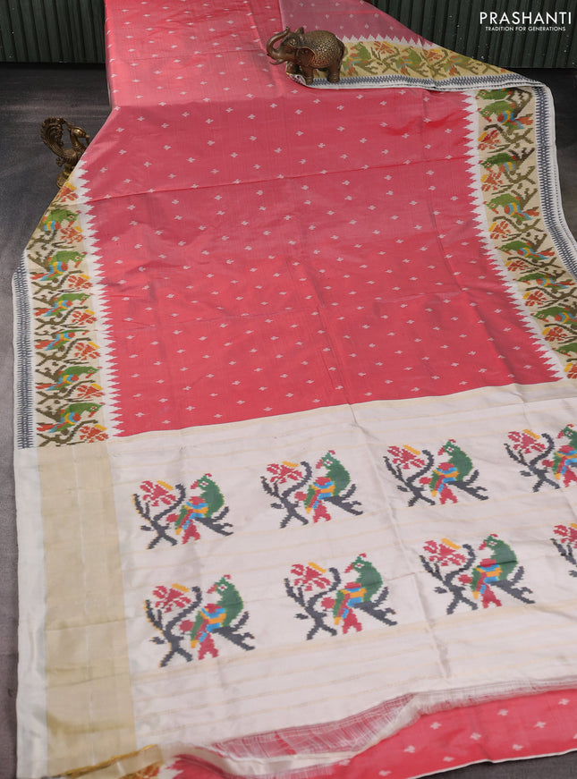 Pochampally silk saree red shade and cream with allover ikat butta weaves and temple design ikat woven zari border