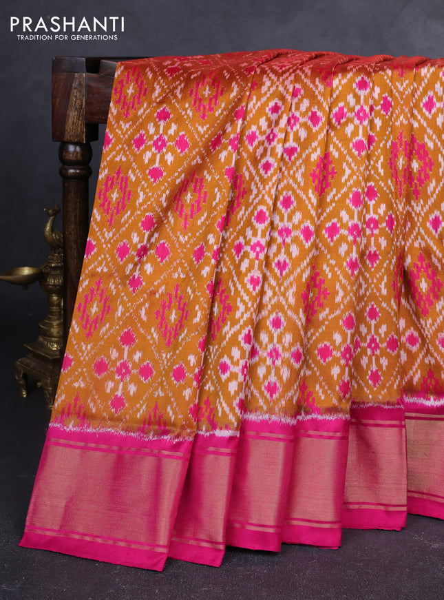 Pochampally silk saree dark mustard and pink with allover ikat weaves and zari woven border