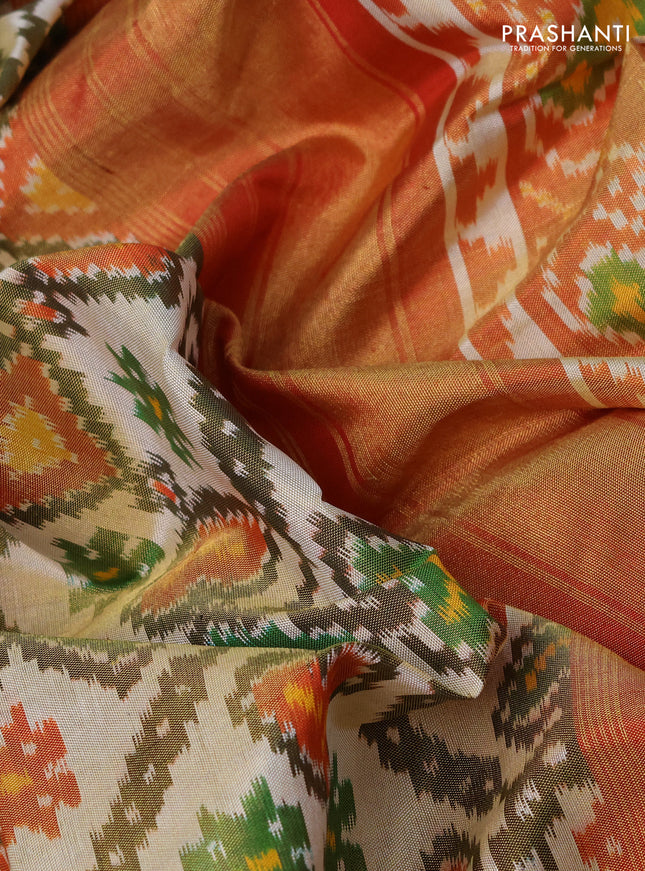 Pochampally tissue silk saree cream and red with allover ikat weaves and zari woven border