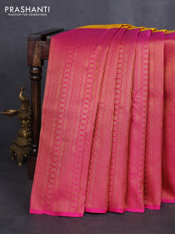 Pure kanchipuram silk saree mustard yellow and pink with half & half style and long zari woven border