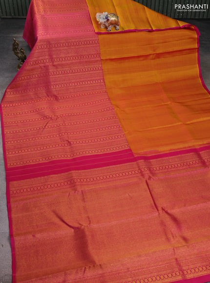 Pure kanchipuram silk saree mustard yellow and pink with half & half style and long zari woven border