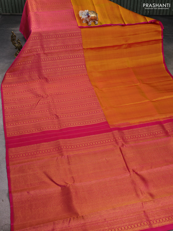 Pure kanchipuram silk saree mustard yellow and pink with half & half style and long zari woven border