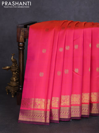 Pure kanchipuram silk saree dual shade of pinkish orange and purple with zari woven buttas and rich zari woven border