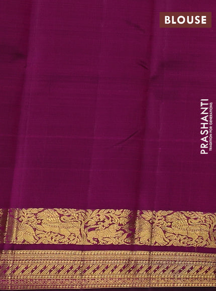 Pure kanchipuram silk saree dual shade of pinkish orange and purple with zari woven buttas and rich zari woven border