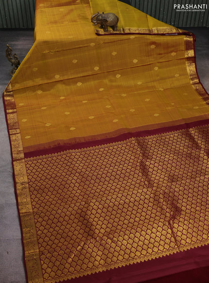 Pure kanchipuram silk saree mehendi green and deep maroon with zari woven buttas and rich zari woven border