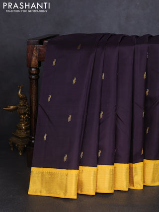 Pure kanchipuram silk saree deep jamun shade and yellow with zari woven buttas and zari woven korvai border