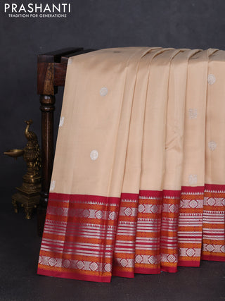Pure kanchipuram silk saree beige and maroon with silver zari woven buttas and thread & zari woven border