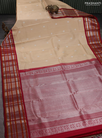 Pure kanchipuram silk saree beige and maroon with silver zari woven buttas and thread & zari woven border
