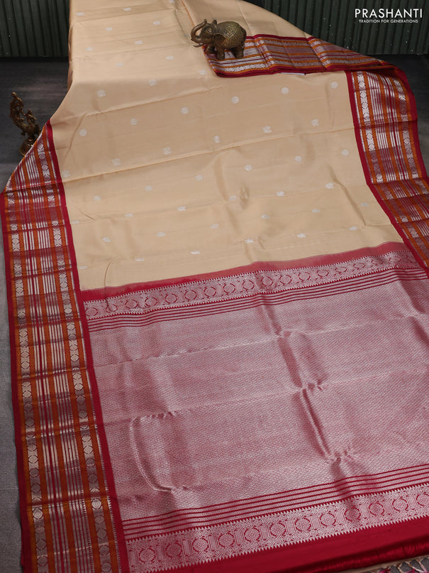Pure kanchipuram silk saree beige and maroon with silver zari woven buttas and thread & zari woven border