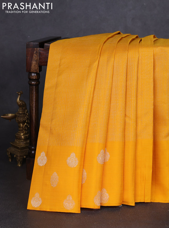 Pure kanchipuram silk saree mustard yellow with allover small zari checked pattern and rich zari woven butta border